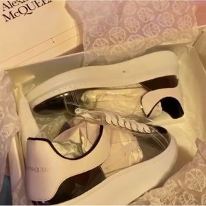 Alexander McQueen clear, black and white sneaker. Very different
